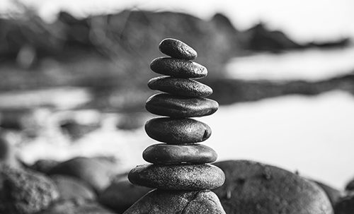 Stones stacked in a pyramid | SV Partners